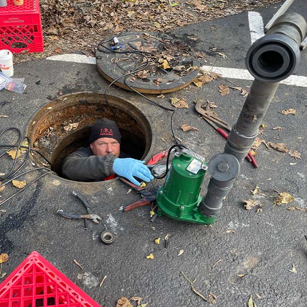 Man working in manhole